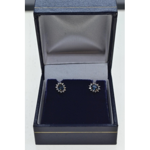 87 - Pair of 9ct gold, sapphire & diamond cluster earrings, gross weight 1.16 grams