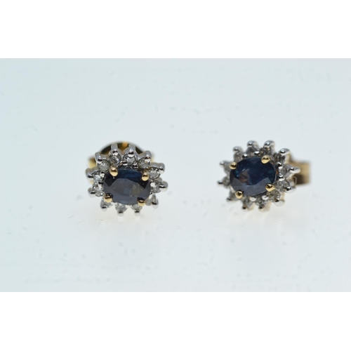 87 - Pair of 9ct gold, sapphire & diamond cluster earrings, gross weight 1.16 grams