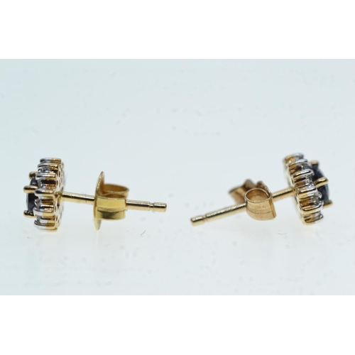 87 - Pair of 9ct gold, sapphire & diamond cluster earrings, gross weight 1.16 grams