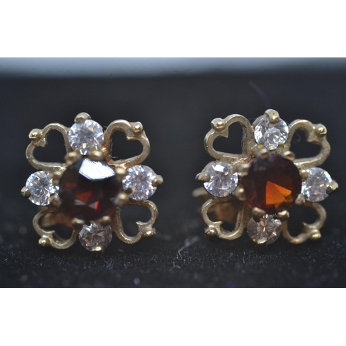 89 - Pair of 9ct gold ruby and diamond earrings, gross weight 1.3g