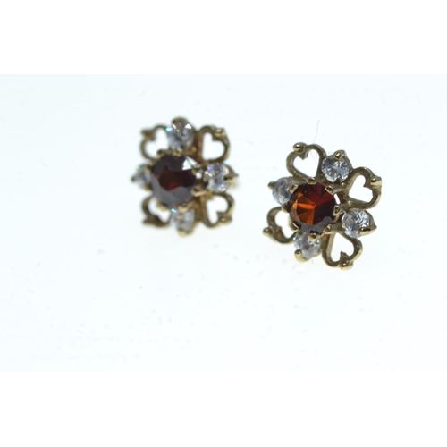 89 - Pair of 9ct gold ruby and diamond earrings, gross weight 1.3g