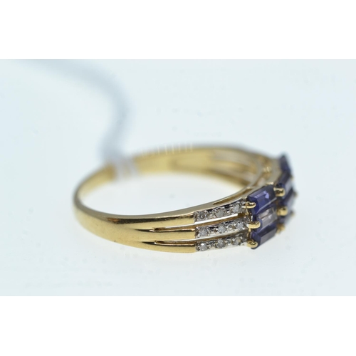 98 - 9ct gold, tanzanite & diamond ring, size R1/2, 2.56 grams