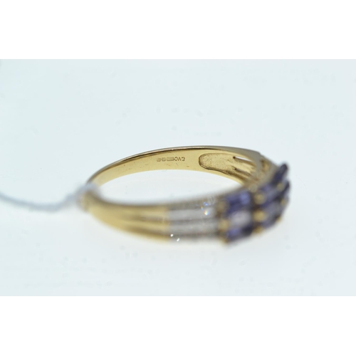 98 - 9ct gold, tanzanite & diamond ring, size R1/2, 2.56 grams