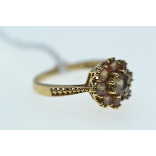 99 - 9ct gold & brown stone cluster ring, size N, 2.51 grams
