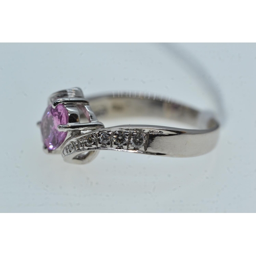 103 - 18ct white gold, pink sapphire & diamond ring, size R1/2, 5.66 grams