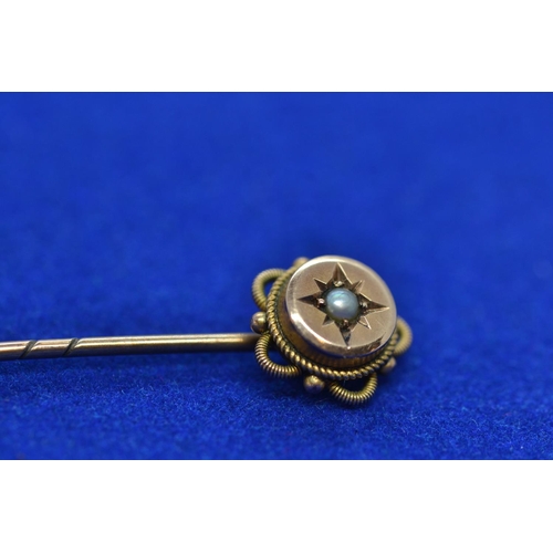 107 - 9ct gold & pearl stick pin, 0.84 gram