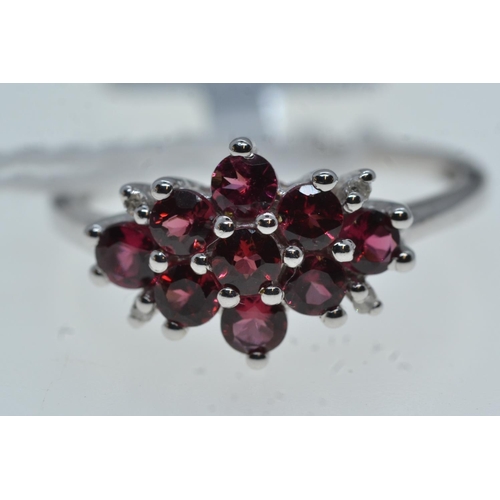 79A - 10ct white gold & red stone cluster ring, size O, 2.42 grams