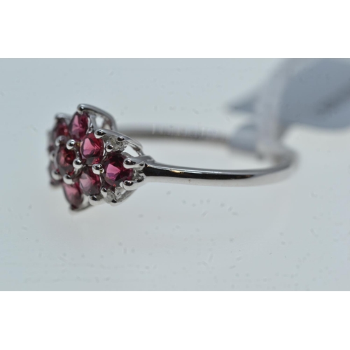 79A - 10ct white gold & red stone cluster ring, size O, 2.42 grams