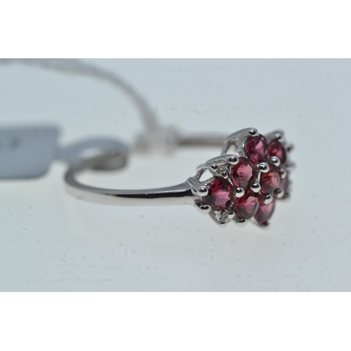79A - 10ct white gold & red stone cluster ring, size O, 2.42 grams