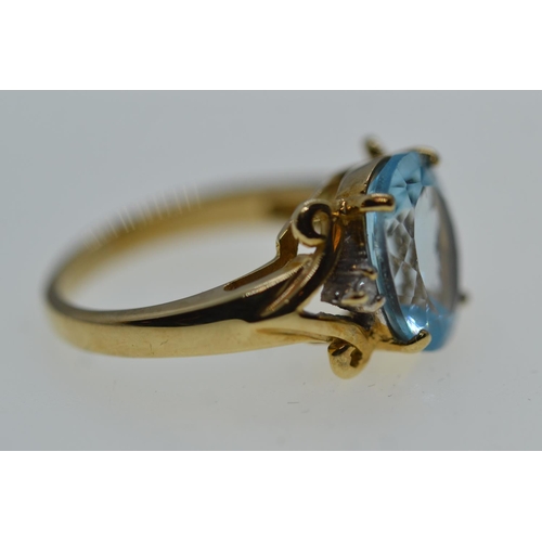 63 - 9ct gold, topaz & diamond ring, size N1/2, 5.2 grams