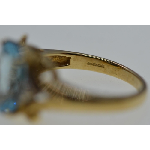 63 - 9ct gold, topaz & diamond ring, size N1/2, 5.2 grams