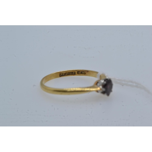 75 - 18ct gold & garnet solitaire ring, size R, 2.65 grams