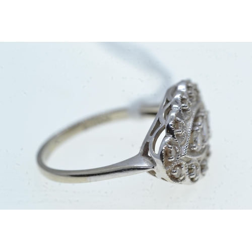 85 - 14ct white gold & diamond cluster ring, size O1/2, 4.42 grams