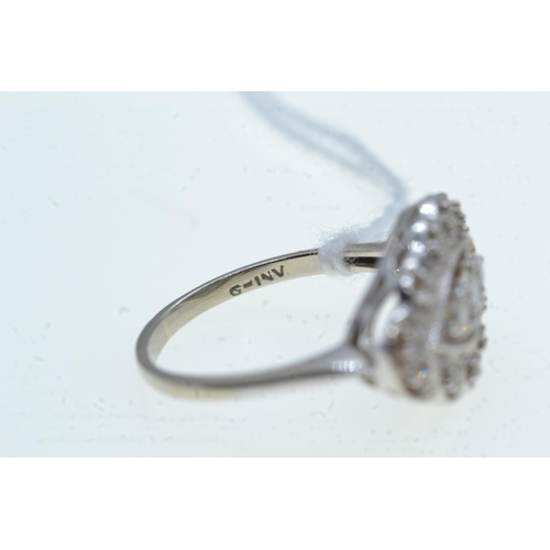 85 - 14ct white gold & diamond cluster ring, size O1/2, 4.42 grams
