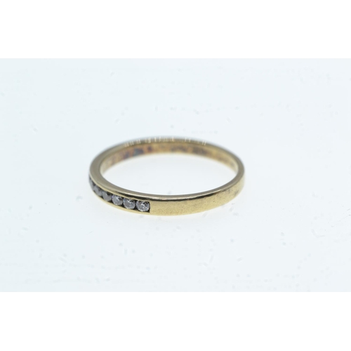 101 - 9ct gold & channel-set half hoop ring, size N, 1.7 grams