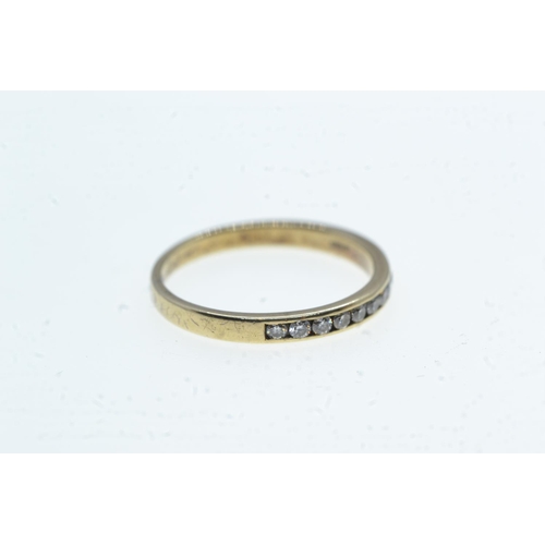 101 - 9ct gold & channel-set half hoop ring, size N, 1.7 grams