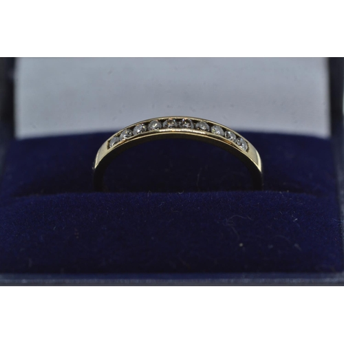 101 - 9ct gold & channel-set half hoop ring, size N, 1.7 grams
