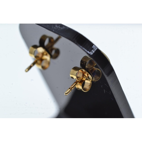109 - Pair of 18ct gold & diamond ear studs, gross weight 2.26 grams