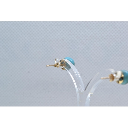 116 - Pair of 9ct gold & turquoise ear studs, gross weight 1.74 grams