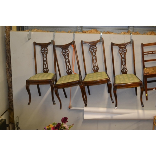 722 - Four Victorian dinner chairs with cabriole legs.