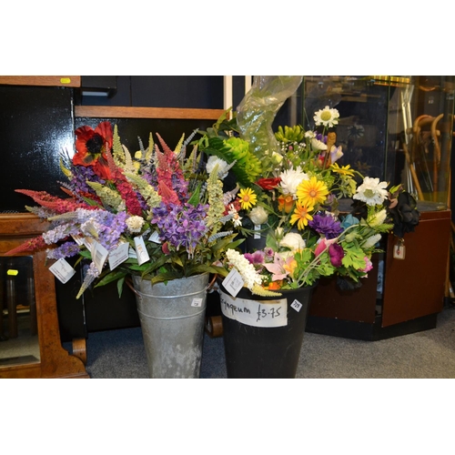 728 - Galvanised vase plus two other buckets of flowers.