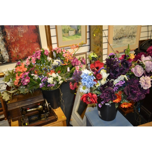 732 - Two large buckets of silk flowers.