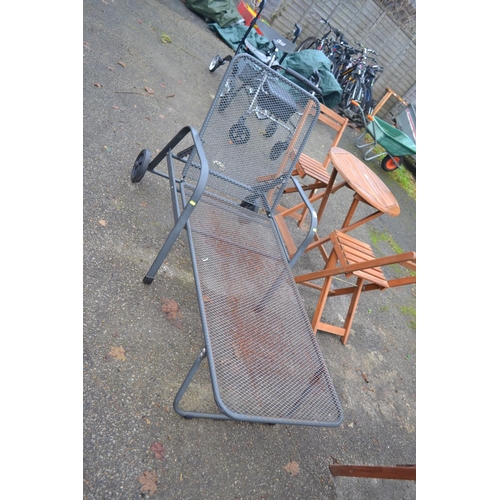 102 - Metal sun lounger with wheels