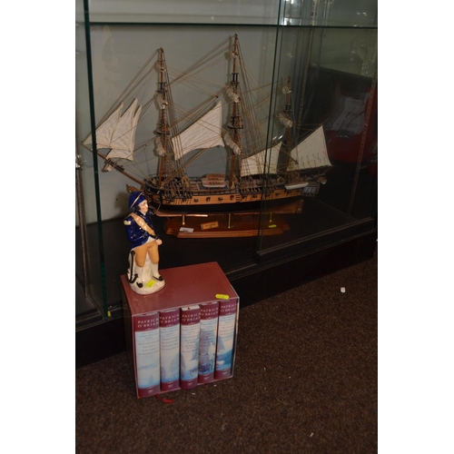 263 - Model of HMS Surprise, 1794 with ceramic captain and set of four Patrick O'Brian 'The Complete Aubre... 