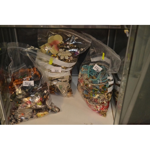 326 - 3 bags of various costume jewellery