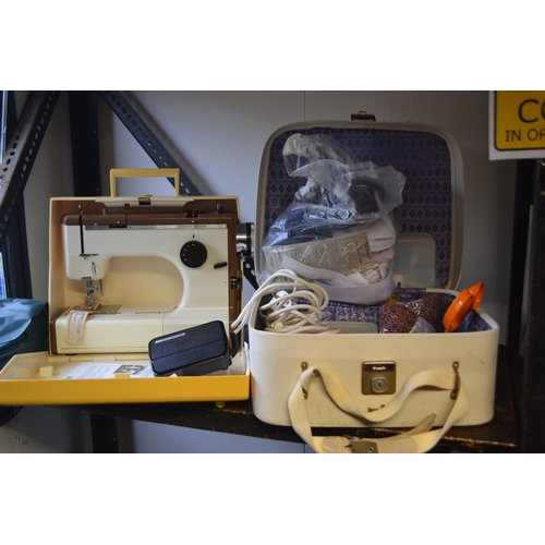 60 - Frister-Rossmann Cub 4 sewing machine with case of haberdashery accessories