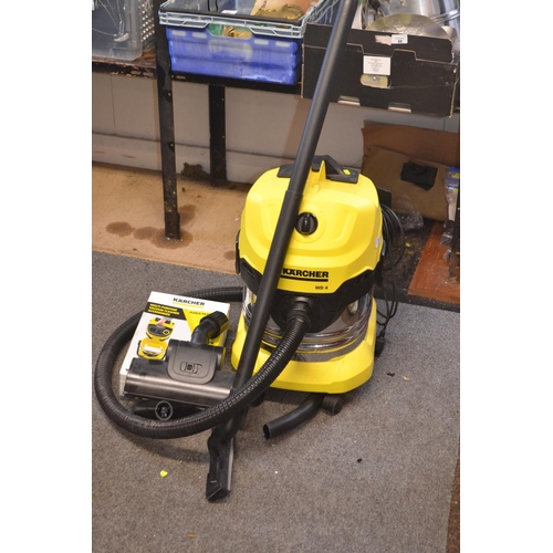 91 - Karcher WD4 vacuum cleaner, with 4x hoover bags, accessories etc.