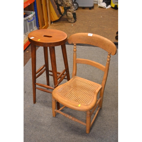 92 - Cane seated low chair together with stool