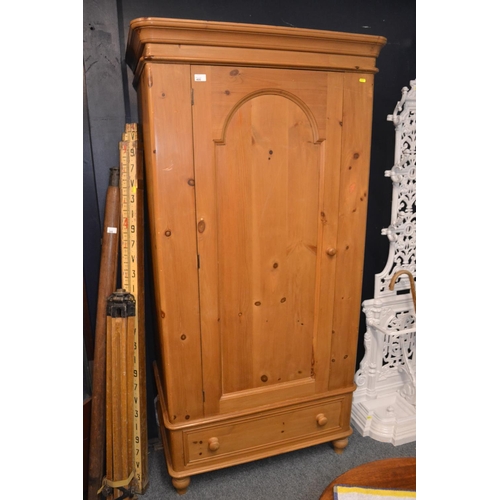 400 - Pine single wardrobe. Splits into 2 for transport. With lower drawer. D60cm W94cm H190cm