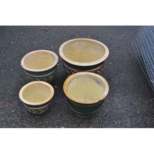 119 - Set of 4 glazed garden planter pots