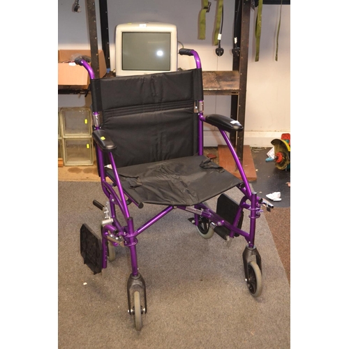 64 - Folding wheel chair by Enigma