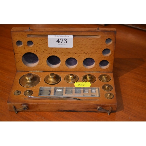 473 - Chemists cased weight set