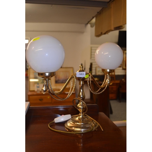 583 - Double glass globed brass pedestal light