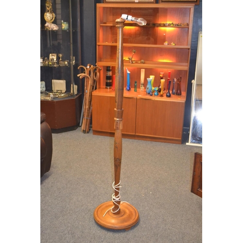 589 - Standard lamp with tropical carvings H151cm