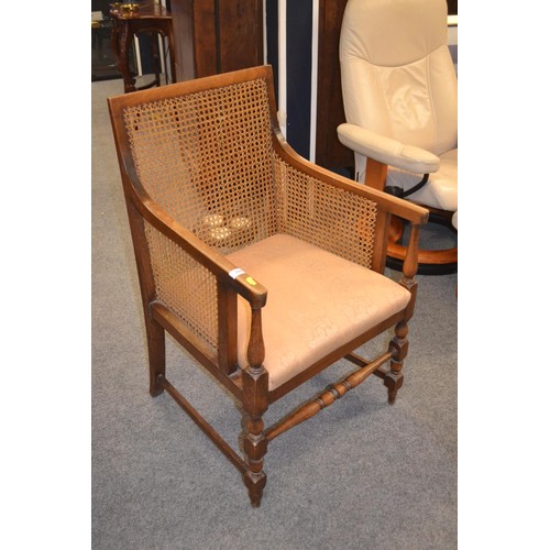 594 - Cane backed arm chair with horsehair filled seat