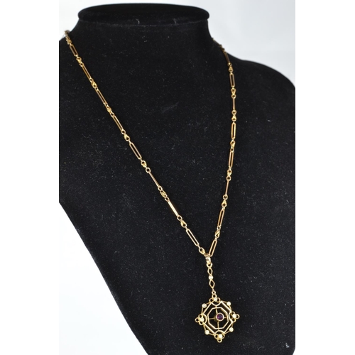 71 - 15ct gold, red stone & seed pearl pendant & 9ct gold chain, pendant length including bale 45... 