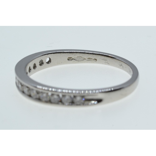 74 - Platinum & diamond half hoop ring, size M, 2.84 grams