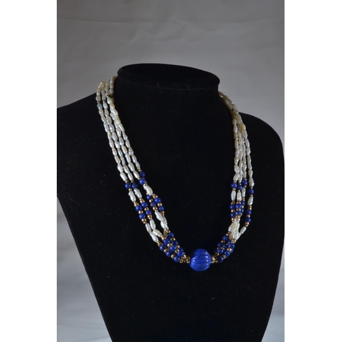 82 - 9ct gold, lapis lazuli & seed pearl necklace, circumference 420mm, one strand loose & requir... 