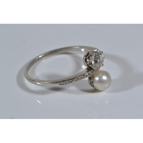 85 - Antique  diamond (.33ct) & pearl ring with channel set diamond shoulders on white metal which te... 