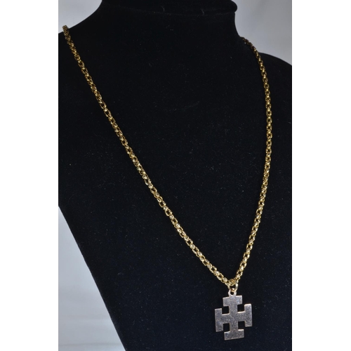 86 - 9ct gold cross pendant & yellow metal chain, chain tests positive for 9ct gold, chain circumfere... 