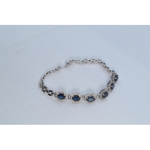 98 - 18ct white gold, sapphire & diamond bracelet, length 170mm, 17.87 grams