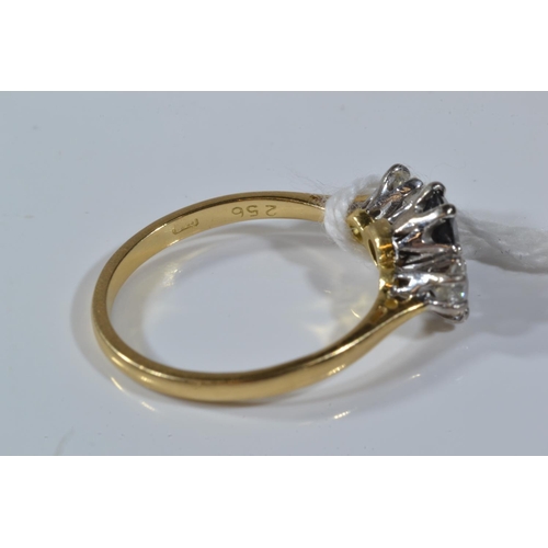 100 - 18ct gold, sapphire & diamond three stone ring, size M, 2.61 grams, scratch to sapphire