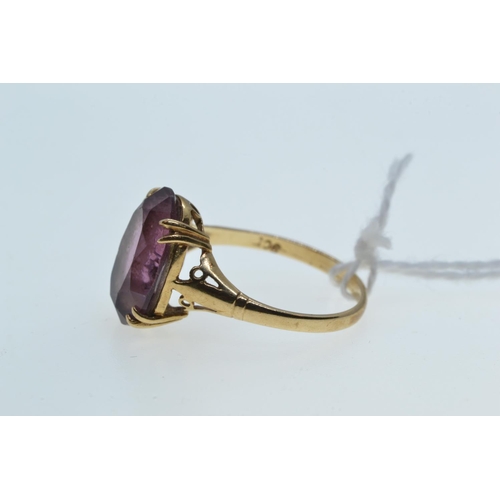 113 - 9ct gold & purple stone ring, size O, 2.4 grams