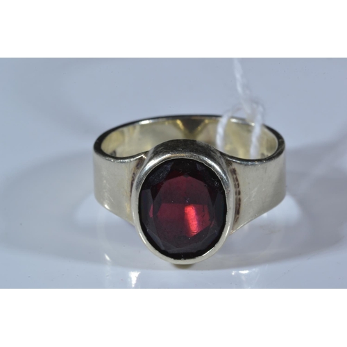 116 - 9ct white gold & red stone ring, size S1/2, 7.9 grams