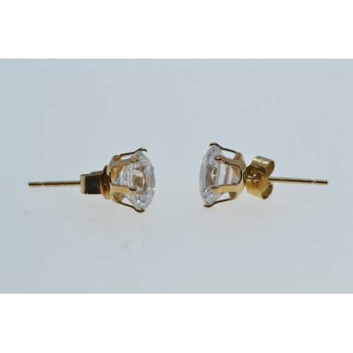 119 - Pair of 9ct gold & white stone ear studs, gross weight 0.92 gram