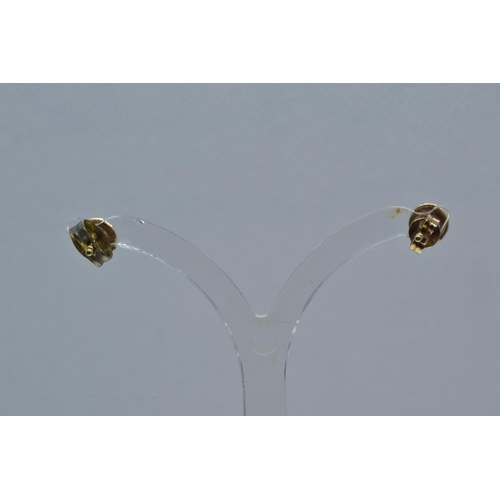 134 - Pair of yellow metal & diamond ear studs, tests positive for 9ct gold, tdw approx. 0.20 carat,&n... 